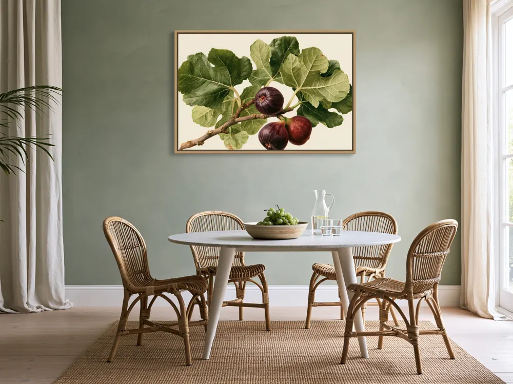 The same fig artwork above a rattan dining table