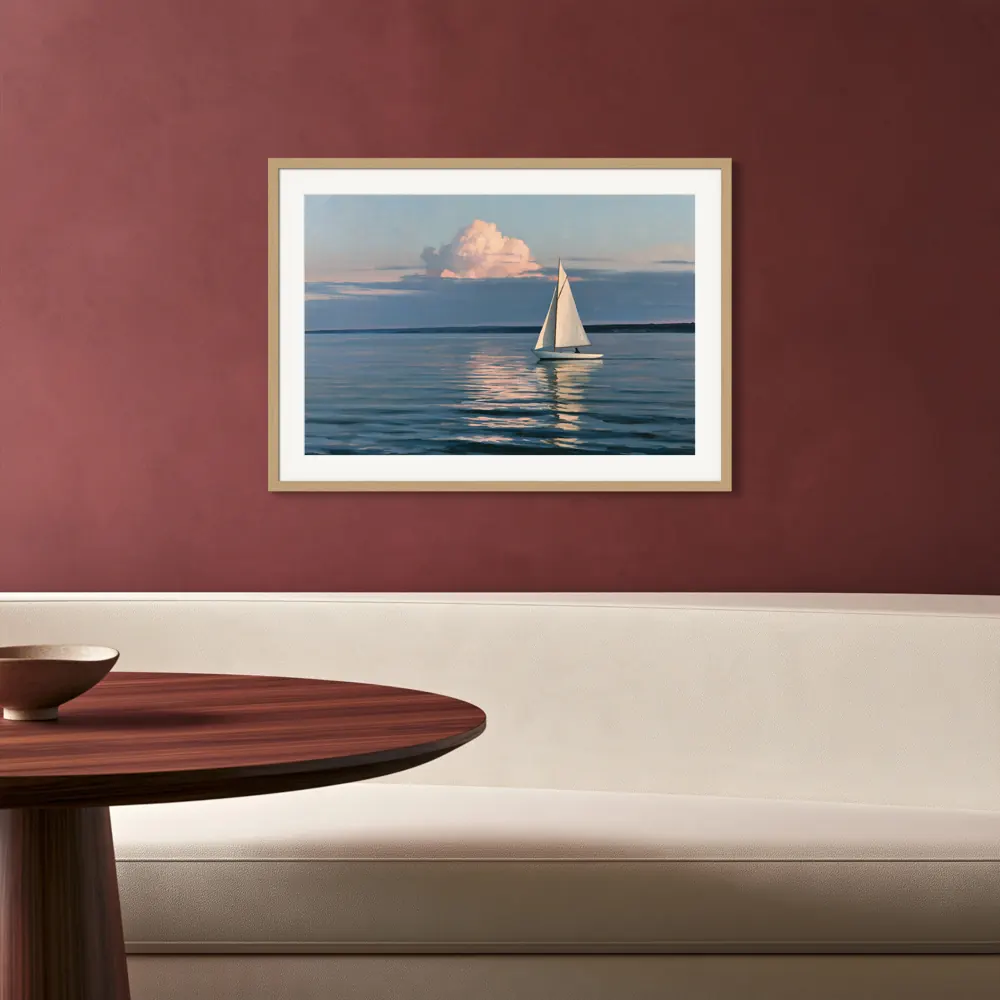 A sailboat-at-dusk oil painting as a natural oak framed print with a white mat in the Burgundy dining banquette
