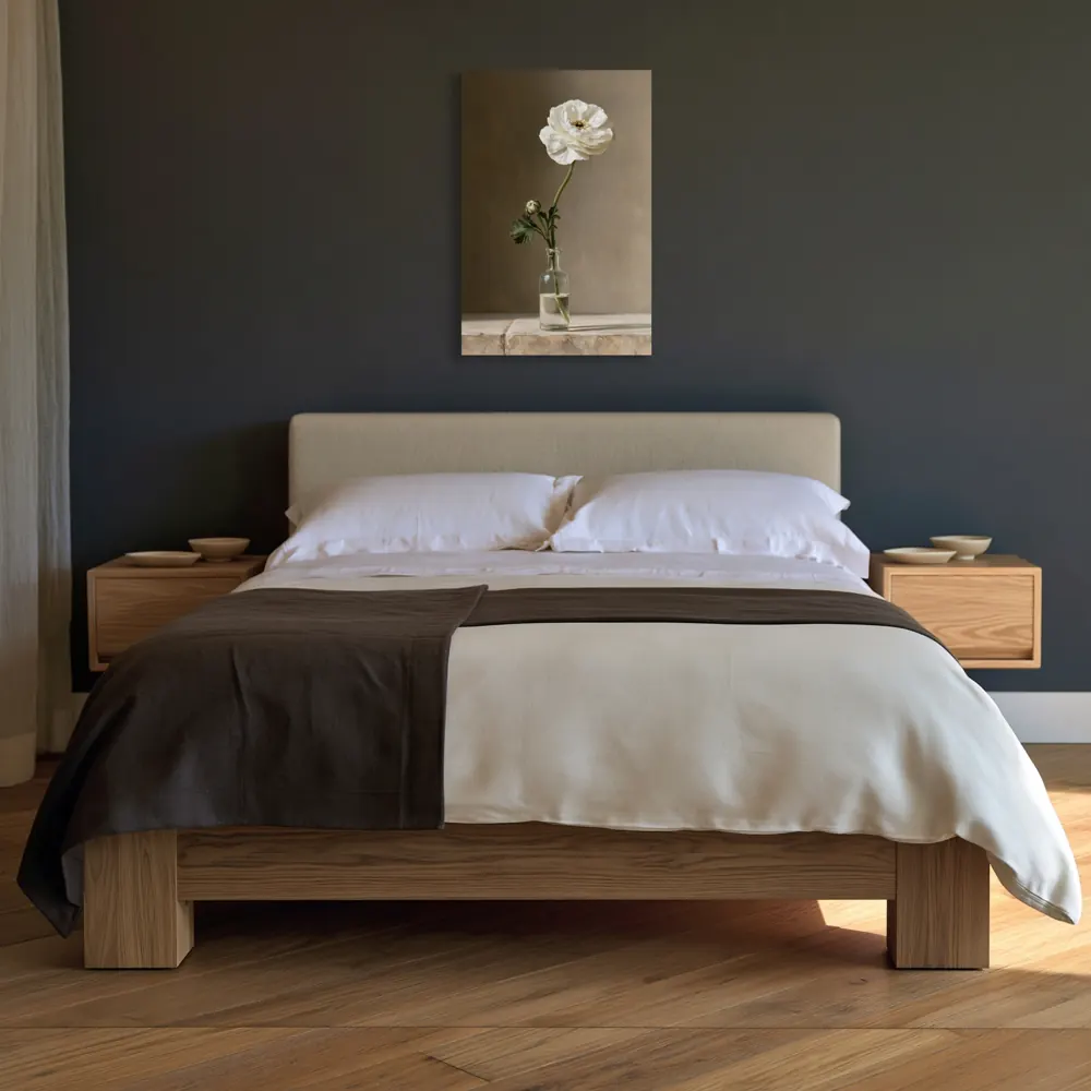 A ranunculus still life as a stretched canvas in the Charcoal wool bedroom