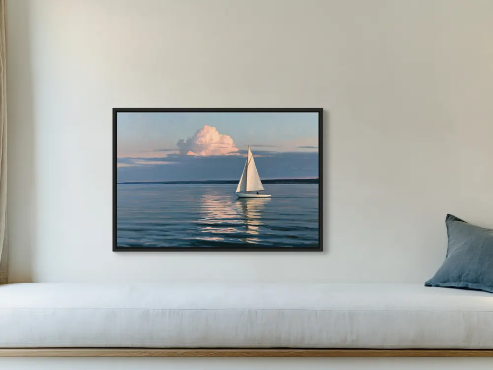 A sailboat-at-dusk oil painting as a black floating-frame canvas in the Coastal linen panorama