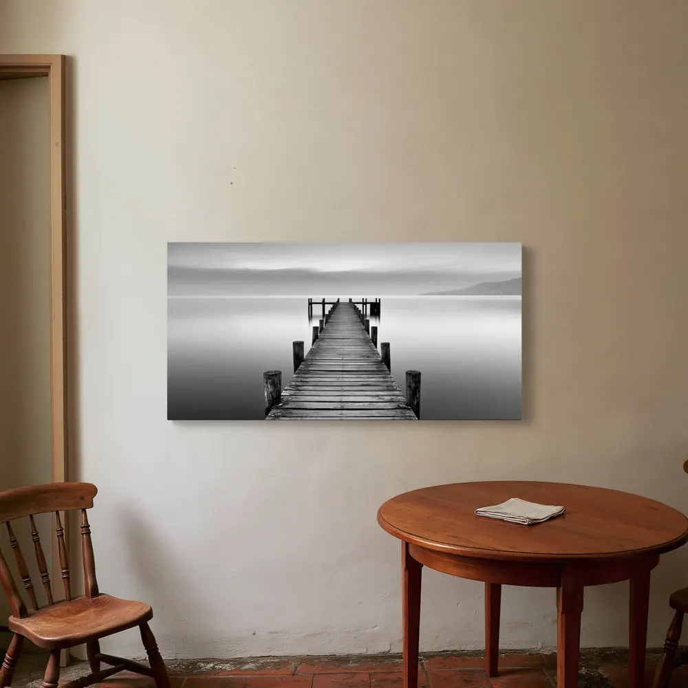 A black-and-white lake pier photograph as a stretched canvas in the Cottage breakfast