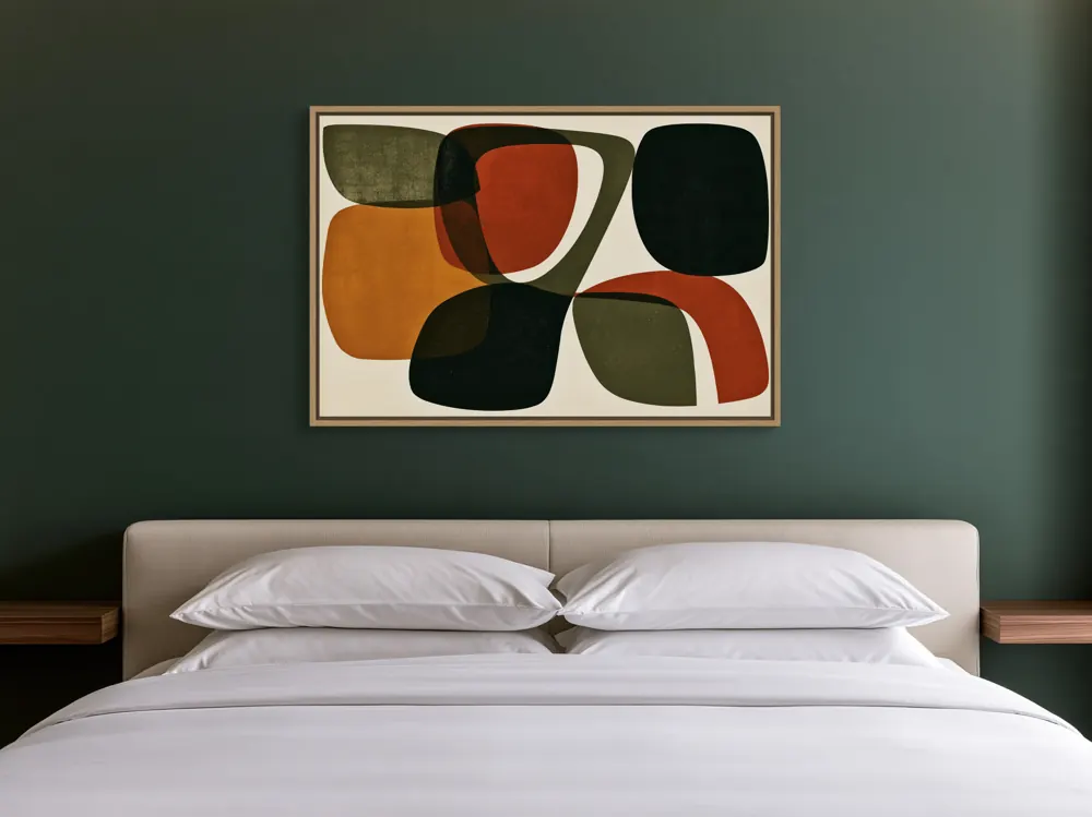 A mid-century abstract as a natural oak floating-frame canvas in the Deep-green hotel bedroom