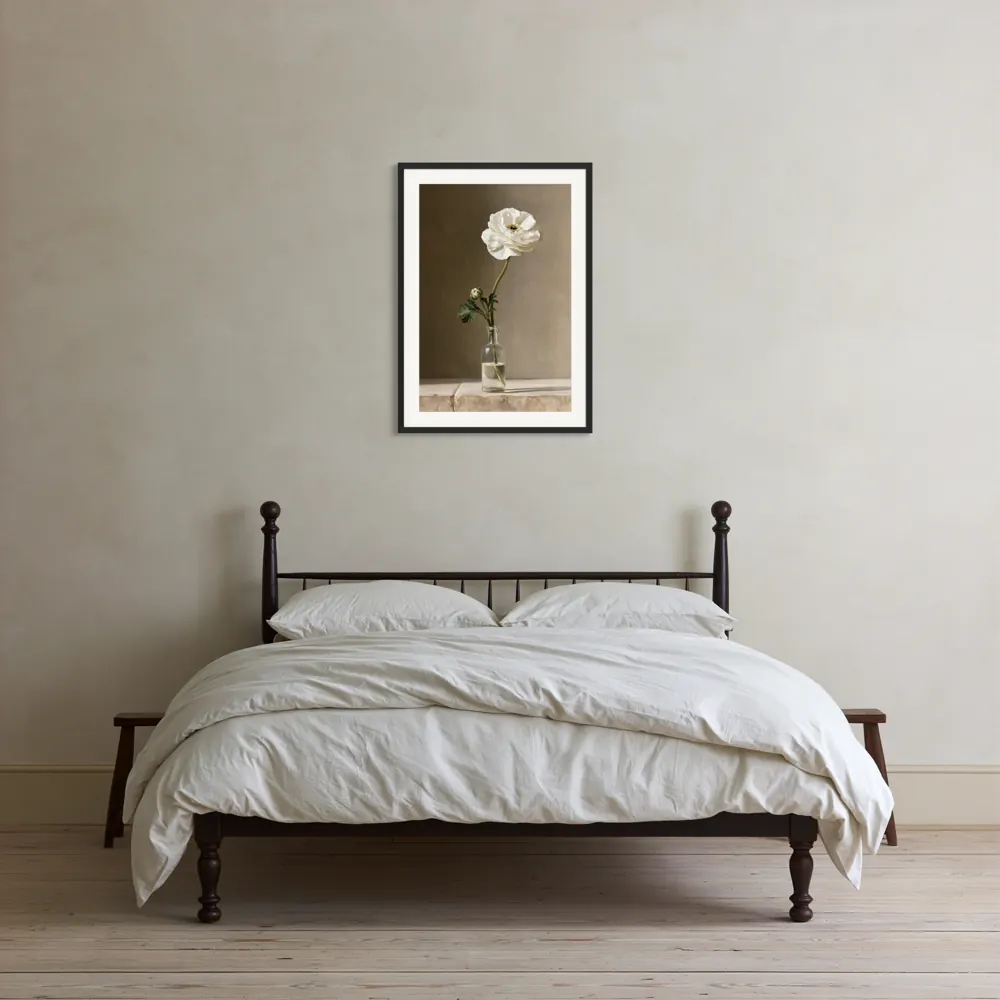 A ranunculus still life as a black framed print with a white mat in the Farmhouse spindle bedroom