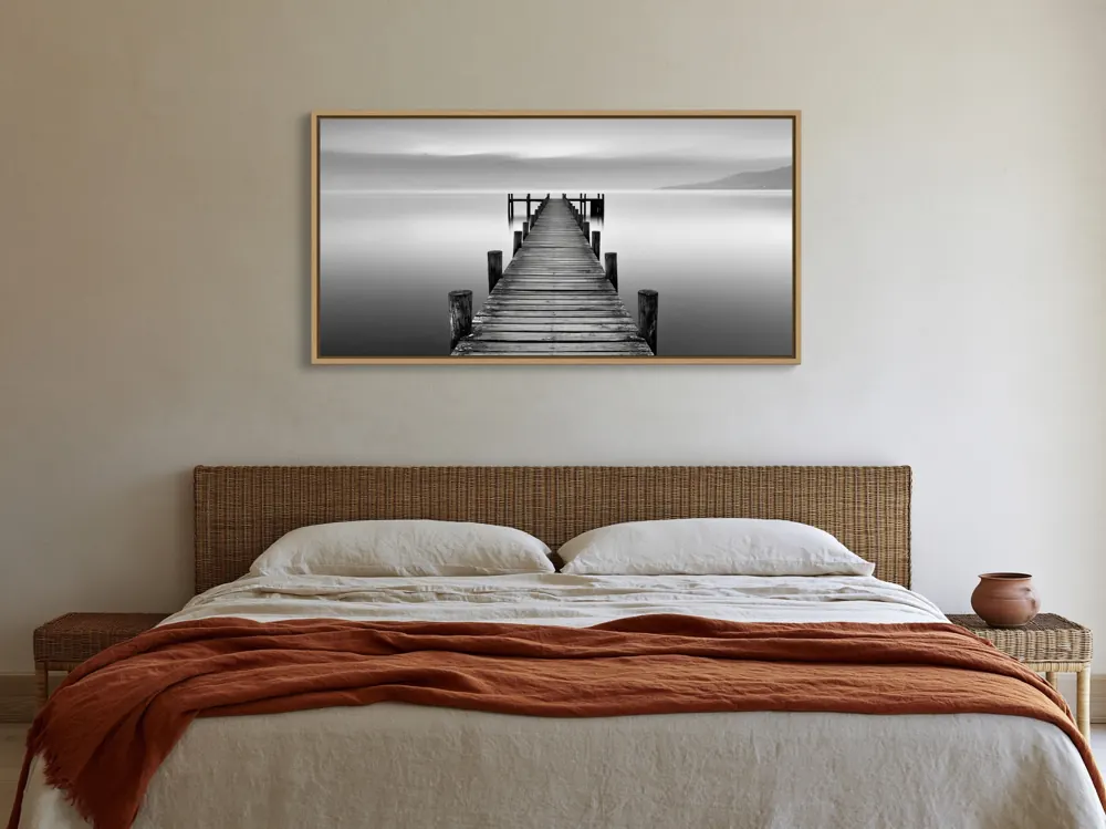 Limewash bedroom with cane headboard