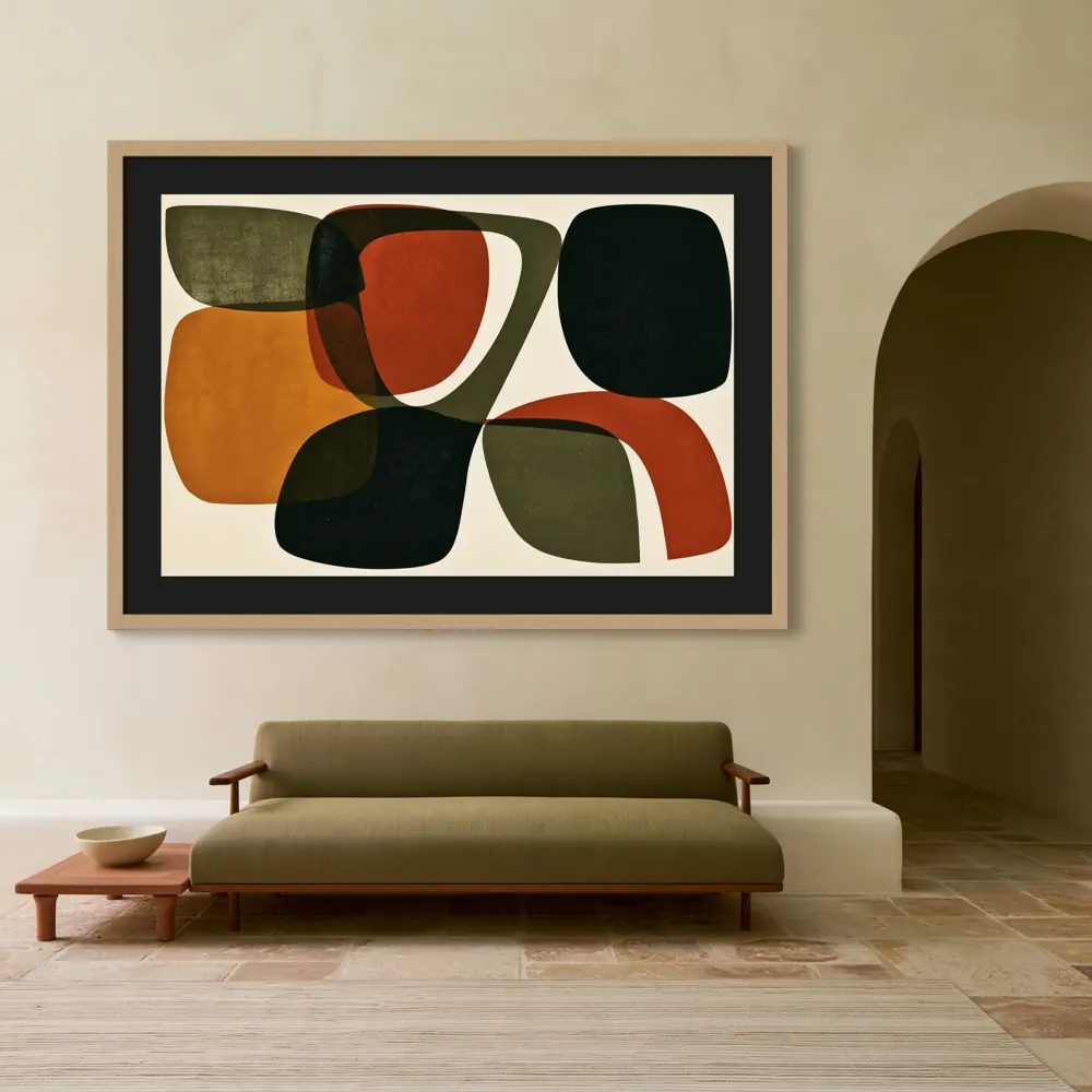 A mid-century abstract as a natural oak framed print, floated on a black mount in the Mediterranean olive salon