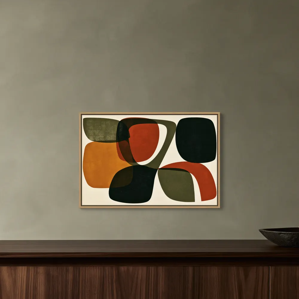 A mid-century abstract as a natural oak floating-frame canvas in the Mineral green wall and walnut cabinet