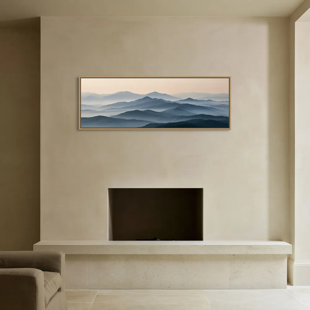 A misty mountain panorama as a natural oak floating-frame canvas in the Oatmeal fireplace wall