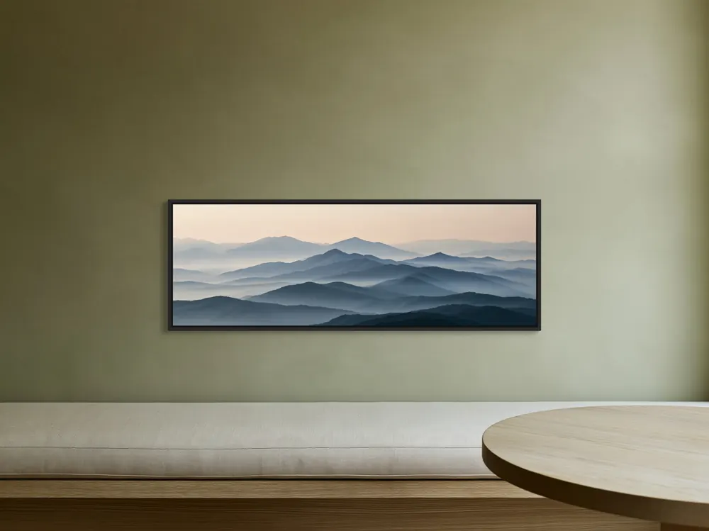 A misty mountain panorama as a black floating-frame canvas in the Olive breakfast alcove