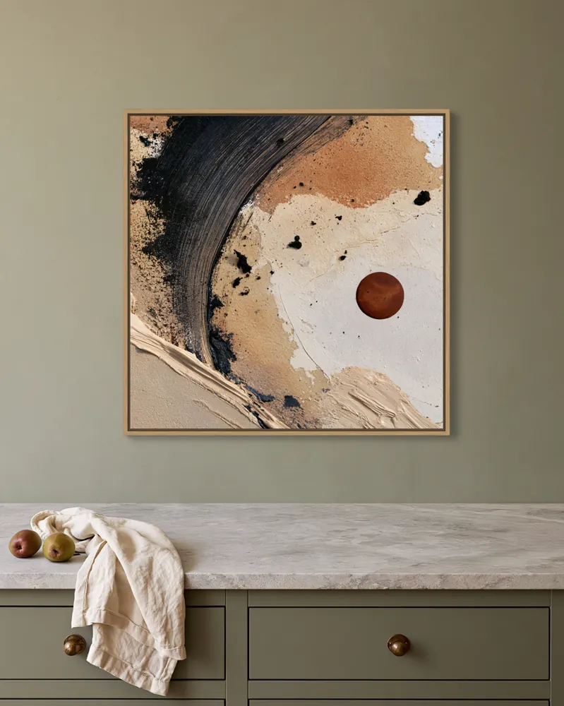 A textured neutral abstract as a natural oak floating-frame canvas in the Olive kitchen
