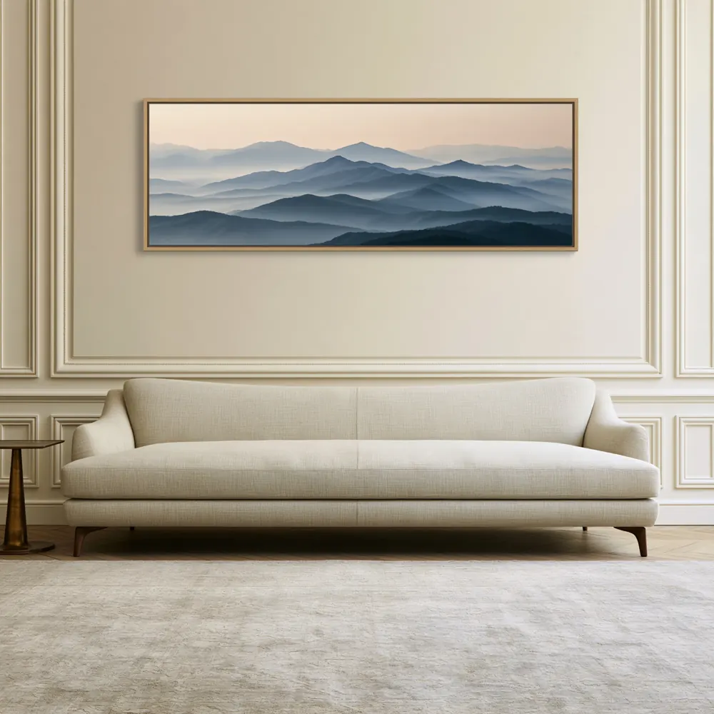 A misty mountain panorama as a natural oak floating-frame canvas in the Parisian ivory salon