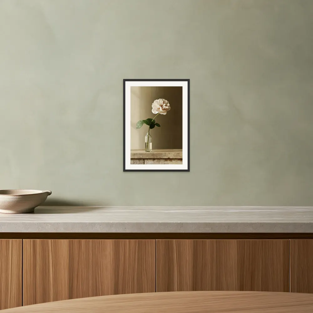 A garden rose still life as a black framed print with a white mat in the Pistachio kitchen counter