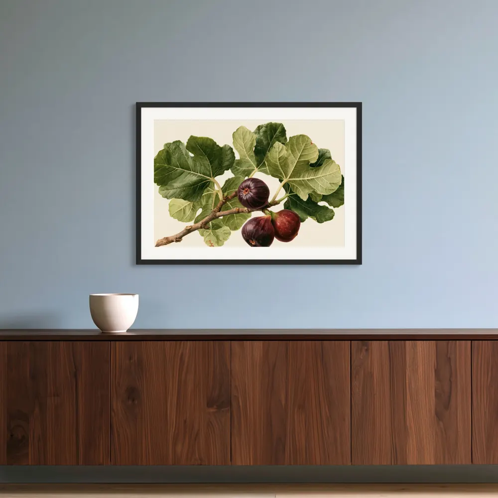 A watercolour fig botanical as a black framed print with a white mat in the Powder-blue walnut console