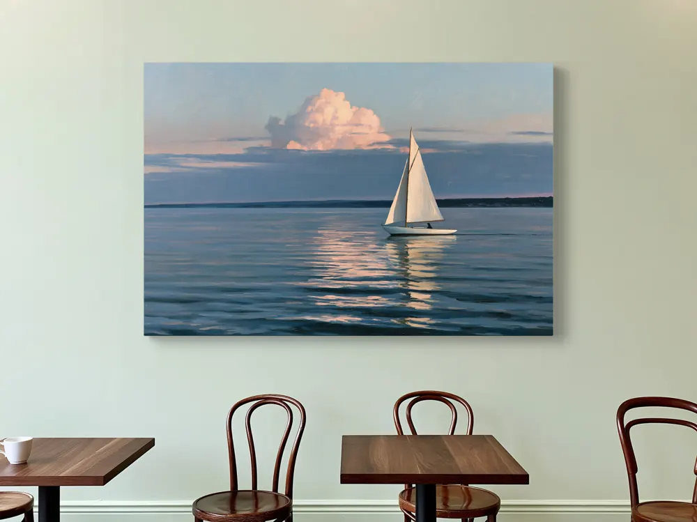 A sailboat-at-dusk oil painting as a stretched canvas in the Sage cafe