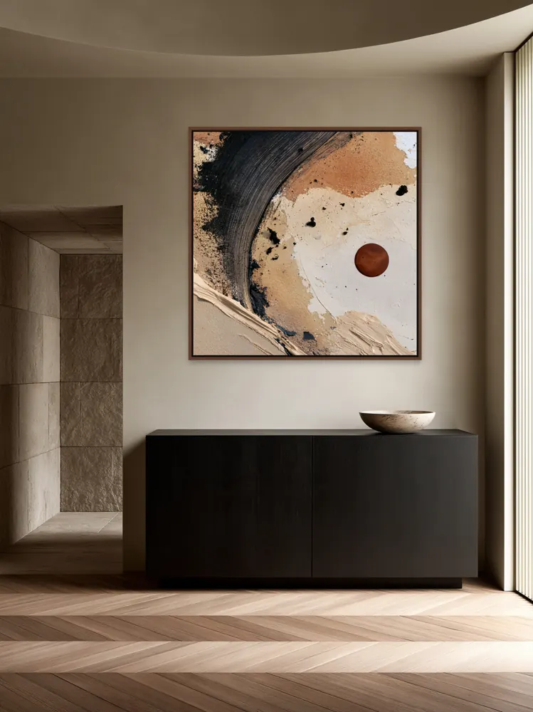 A textured neutral abstract as a walnut floating-frame canvas in the Sandstone city-apartment vestibule