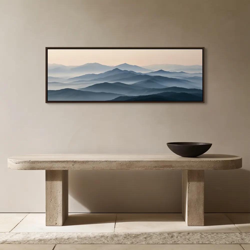 A misty mountain panorama as a espresso floating-frame canvas in the Travertine entry console