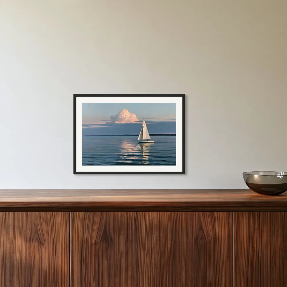 A sailboat-at-dusk oil painting as a black framed print with a white mat in the Walnut sideboard